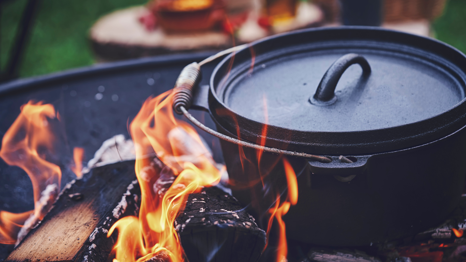 cast iron pot on a campfire