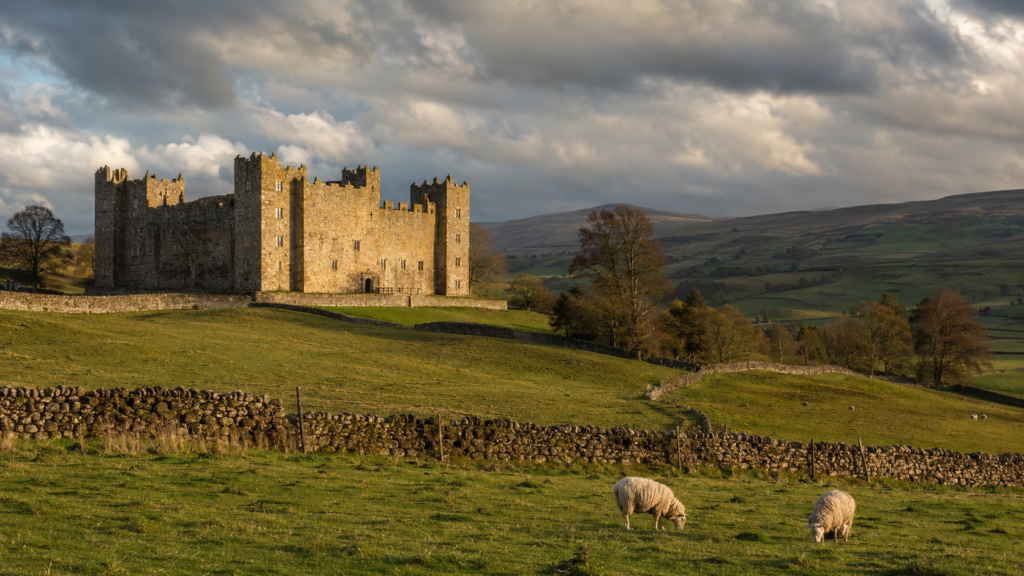Bolton Castle medieval fortress surrounded by dry-stone-walled fields in Wensleydale, Yorkshire Dales