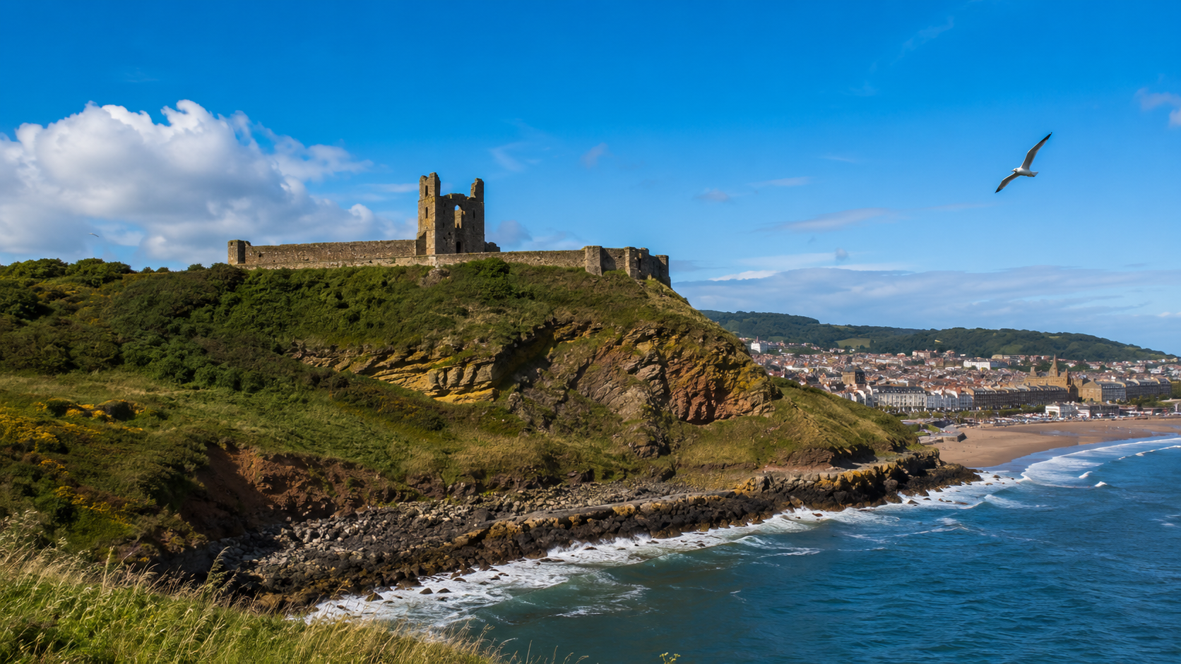 Scarborough Castle ruins on the clifftop headland above the North Sea on the Yorkshire coast