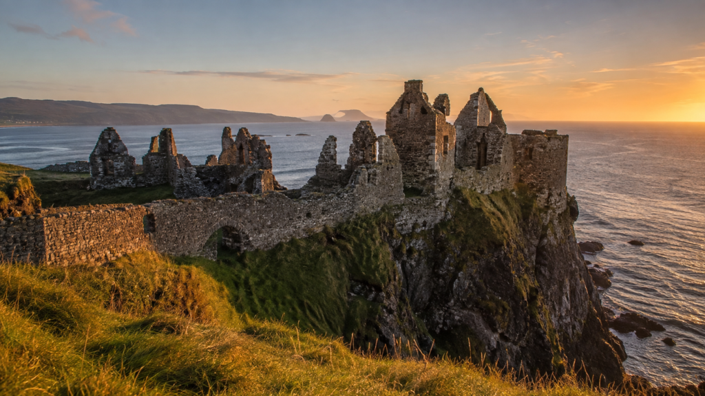 Ruined clifftop castle in Scotland at golden hour, an example of a free castle to visit in the UK